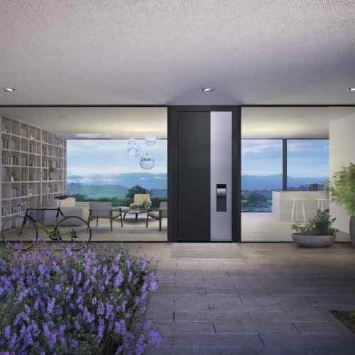 Hörmann Haustür ThermoCarbon mit SmartKey Keypad — Panoramahaus mit Meerblick und Lavendel
